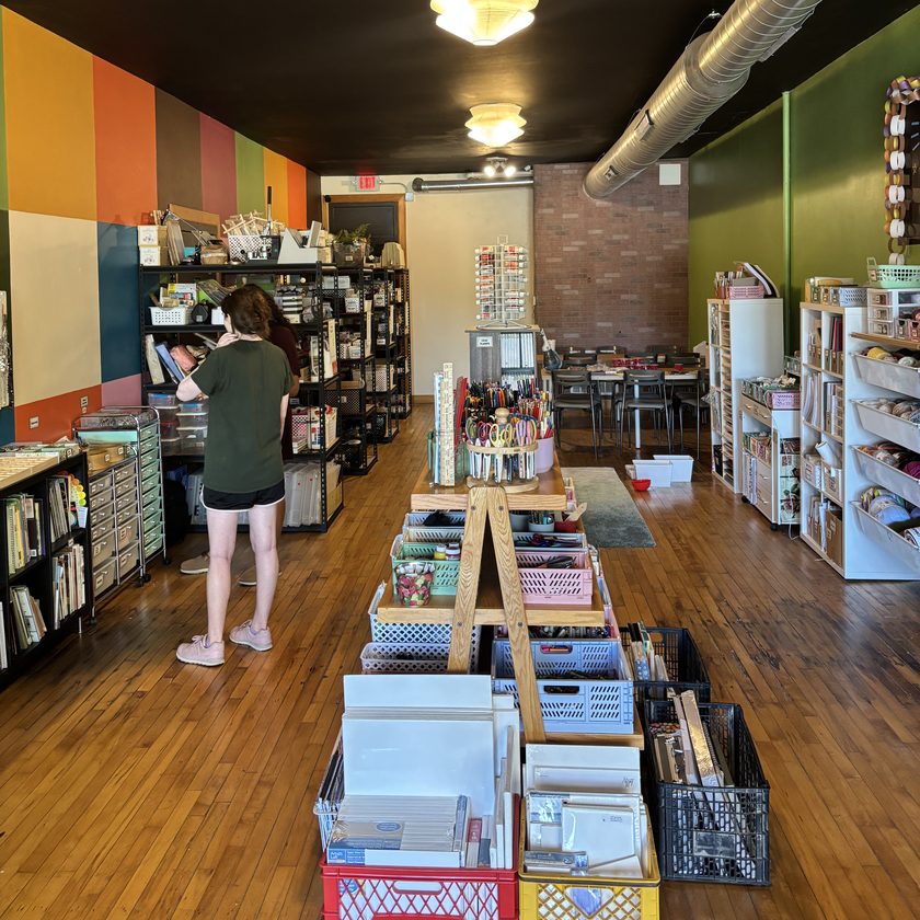 A shopper browsing the supply aisle at 414 Art Revival
