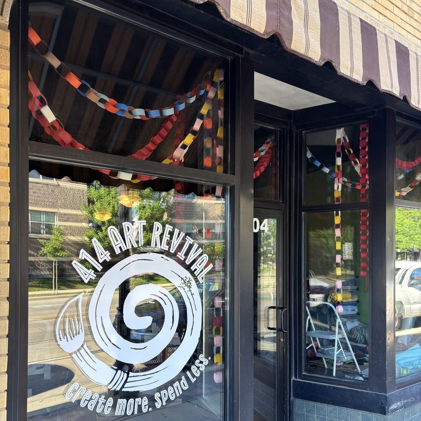 The 414 Art Revival storefront on West National Avenue, the shop logo painted on the front window